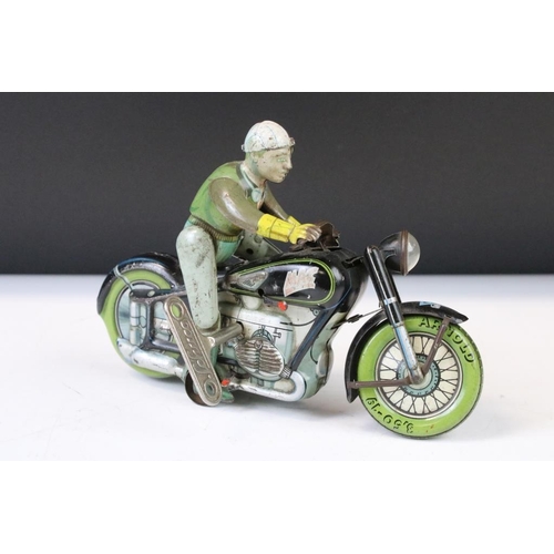 1356 - Arnold Mac 700 tin plate clockwork motorcycle model with Schuco key, paint wear and some discolourin... 