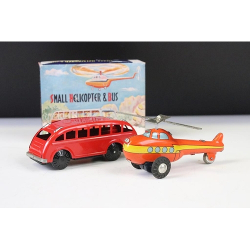 1357 - Two boxed tin plate toys to include Small Helicopter & Bus MF806 (China) and Trotty Trotty Mechanioc... 