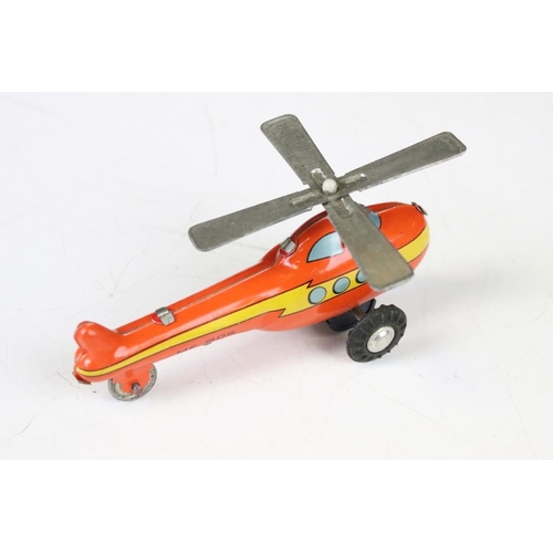 1357 - Two boxed tin plate toys to include Small Helicopter & Bus MF806 (China) and Trotty Trotty Mechanioc... 