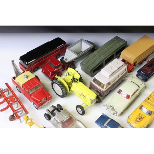 1314 - Quantity of mid 20th C play worn diecast models and accessories to include Corgi, Dinky, Matchbox ex... 