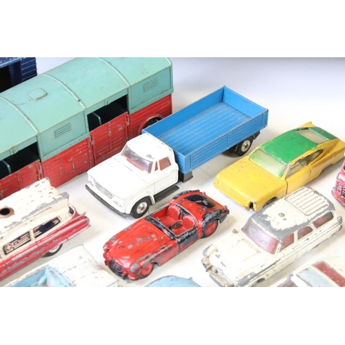 1318 - Around 75 mostly mid 20th C play worn diecast, tin plate & plastic models, to include Dinky, Triang ... 