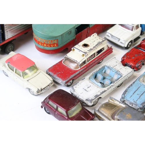 1318 - Around 75 mostly mid 20th C play worn diecast, tin plate & plastic models, to include Dinky, Triang ... 