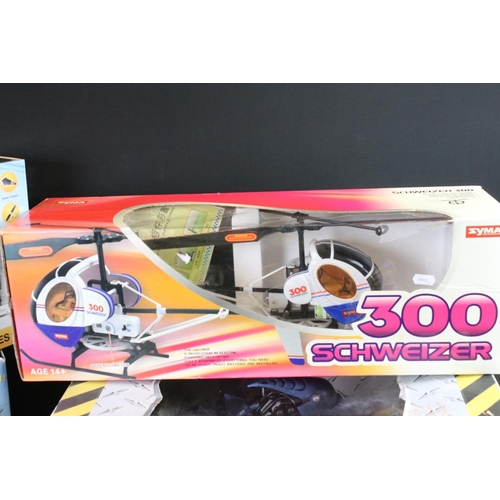 342 - Radio Control - Three boxed R/C helicopters to include Syma 300 Schweizer, Global Gizmos Indestructi... 