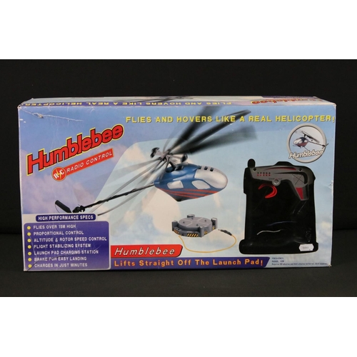 342 - Radio Control - Three boxed R/C helicopters to include Syma 300 Schweizer, Global Gizmos Indestructi... 