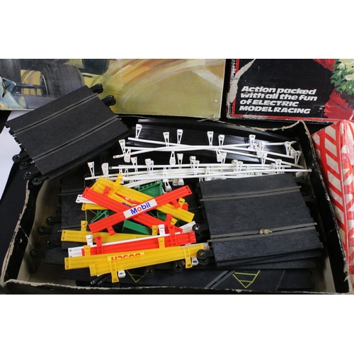 343 - Quantity of Scalextric contained within 4 x boxed sets, features Formula 1 GP8 set with both slot ca... 