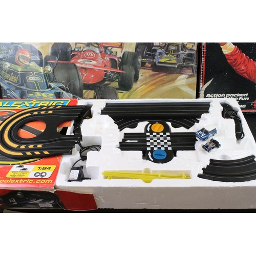 343 - Quantity of Scalextric contained within 4 x boxed sets, features Formula 1 GP8 set with both slot ca... 