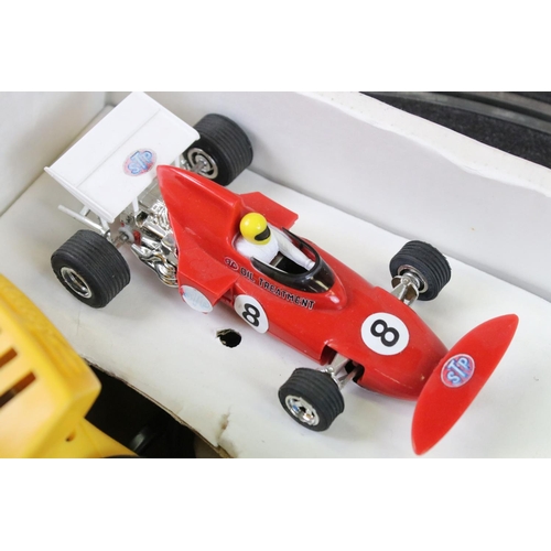 343 - Quantity of Scalextric contained within 4 x boxed sets, features Formula 1 GP8 set with both slot ca... 