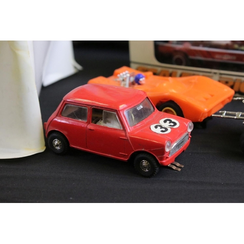 344 - Scalextric - Five Scalextric slot cars (boxed C117 3.0 Ford Capri, C76 Austin Mini Cooper, C23 Arrow... 