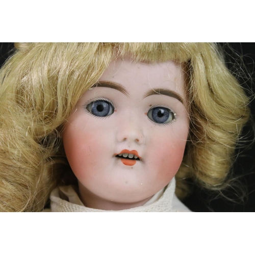 420 - Two Early 20th century Bisque Head Dolls including Schutzmeister & Quendt Doll impressed marks 101 D... 