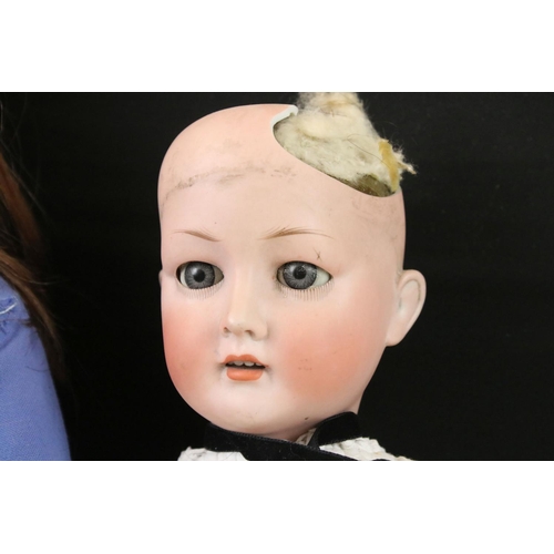 421 - Two Early 20th century Bisque Head Dolls including Revalo Doll with impressed marks 7, 54cm long and... 