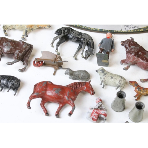 313 - Quantity of mid 20th C metal figures to include Britains farm animals and accessories, Wild West, fl... 