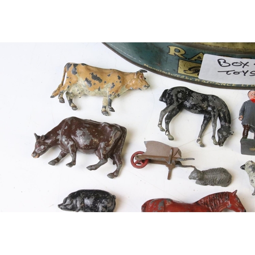 313 - Quantity of mid 20th C metal figures to include Britains farm animals and accessories, Wild West, fl... 