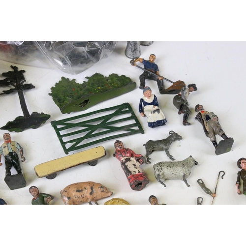 313 - Quantity of mid 20th C metal figures to include Britains farm animals and accessories, Wild West, fl... 