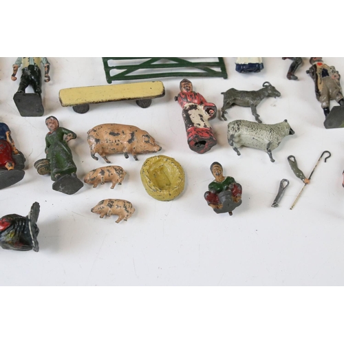 313 - Quantity of mid 20th C metal figures to include Britains farm animals and accessories, Wild West, fl... 