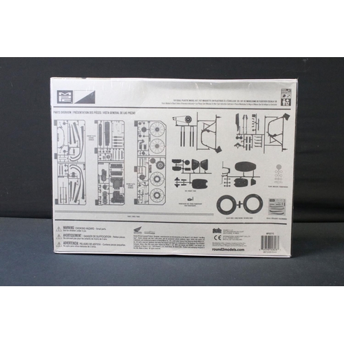 371 - Three boxed sealed plastic model kits to include MPC827/12 1:8 scale Honda 750 Four, Heller 1:24 Jag... 