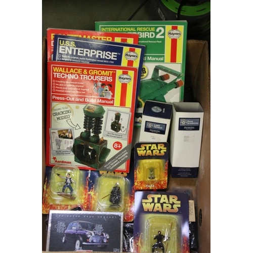 256 - Large quantity of toys, annuals and accessories to include carded Star Wars metal figures, 3 x Corgi... 