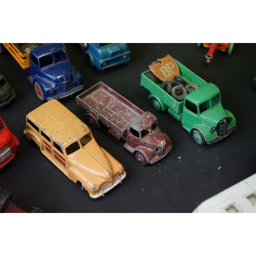 1288A - Around 55 mid 20th C play worn diecast models, mostly Dinky examples, featuring Dinky Supertoys Hors... 