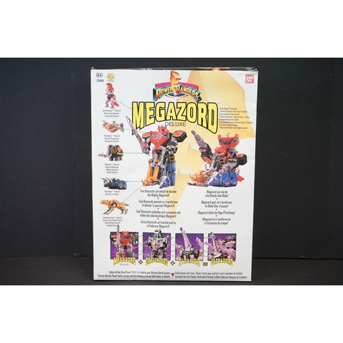 1501 - Bandai Power Rangers - A boxed Megazord Deluxe Set (2260), boxed Trini Yellow Ranger (2200) and boxe... 