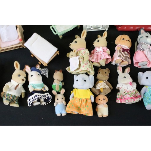 440 - Collection of Tomy / Epoch Sylvanian Families figures, accessories & playsets to include 24 figures,... 