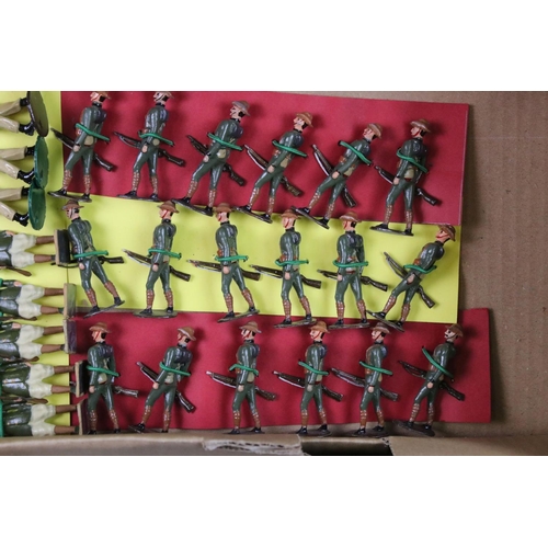 324 - Over 125 assorted metal soldier figures, mostly recasts of Britains, featuring Alan Goodwin figures.... 