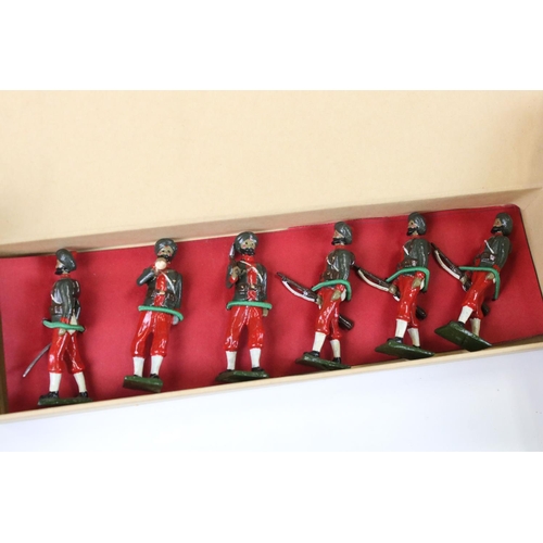 324 - Over 125 assorted metal soldier figures, mostly recasts of Britains, featuring Alan Goodwin figures.... 