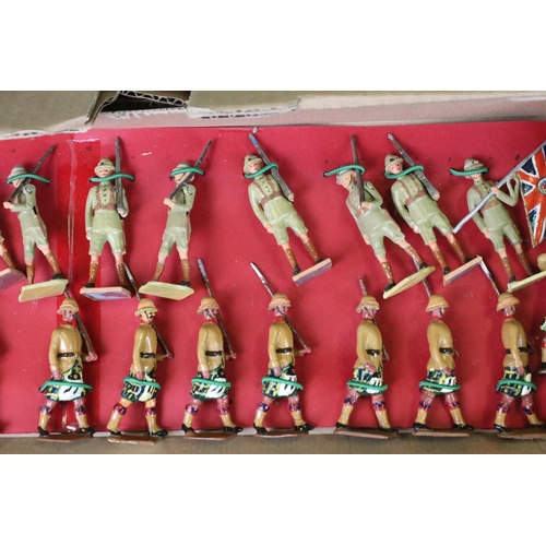 324 - Over 125 assorted metal soldier figures, mostly recasts of Britains, featuring Alan Goodwin figures.... 