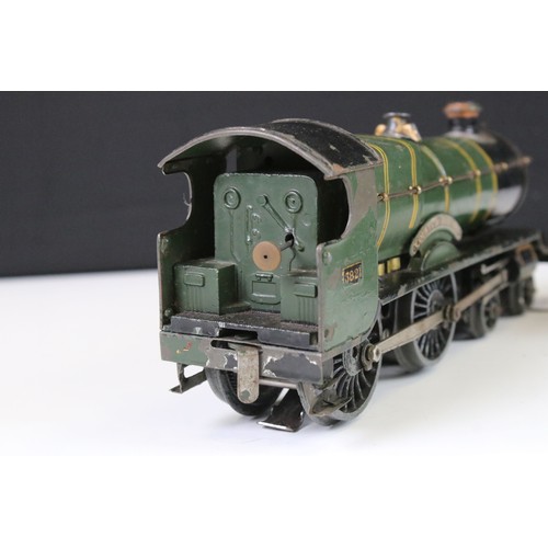 148 - Hornby O gauge 4-4-0 County of Bedford GWR 3821 locomotive with tender, green livery, showing wear a... 