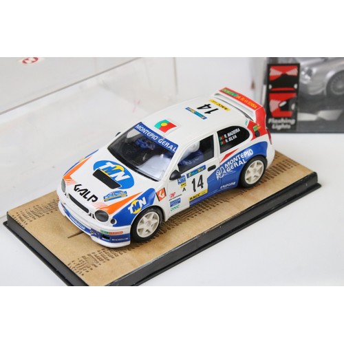 294 - Nine cased / boxed Ninco slot cars to include, 50101 Renault Clio 16V, 50102 Renault Clio 16V, 50104... 