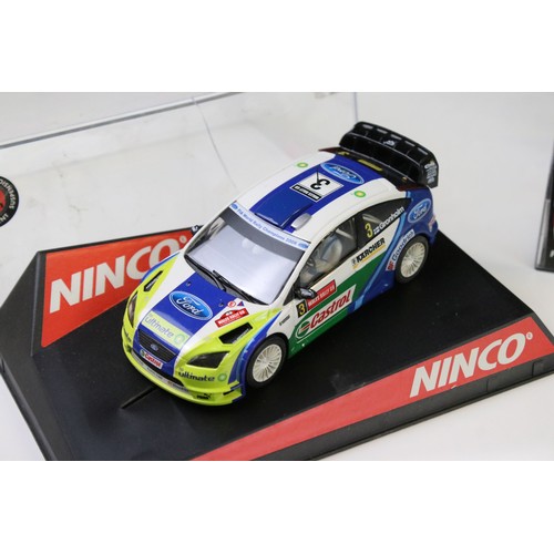 294 - Nine cased / boxed Ninco slot cars to include, 50101 Renault Clio 16V, 50102 Renault Clio 16V, 50104... 