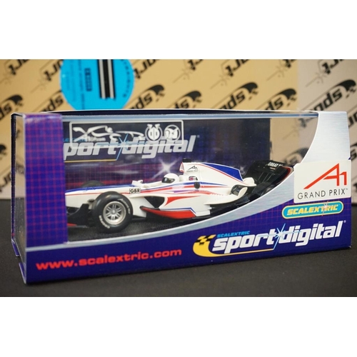 302 - Four boxed Scalextric Digital Sport items to include cased C2706D A1 Grand Prix Team GB slot car, C7... 