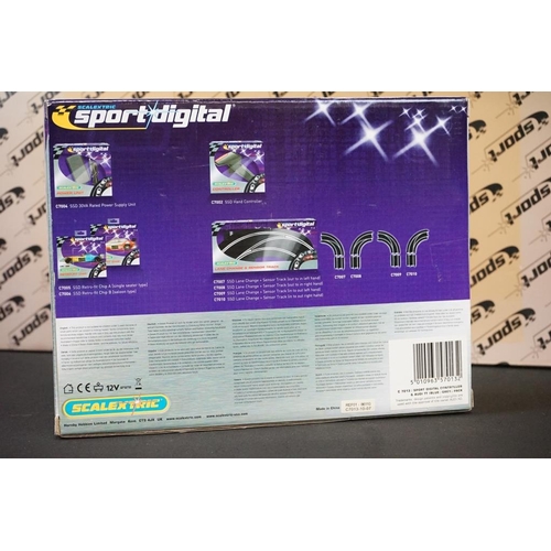 302 - Four boxed Scalextric Digital Sport items to include cased C2706D A1 Grand Prix Team GB slot car, C7... 