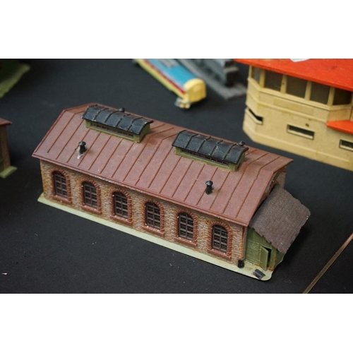 128 - Quantity of OO gauge model railway to include 9 x boxed items of rolling stock, various track, plast... 