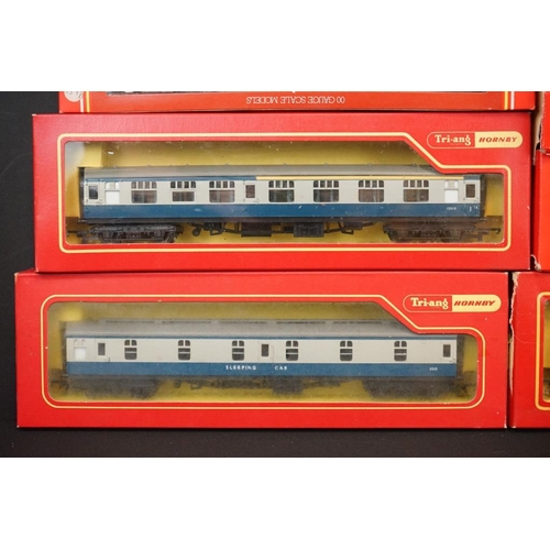 129 - 21 Boxed OO gauge items of rolling stock to include 17 x Hornby/Triang and 3 x Lima, mainly coaches,... 