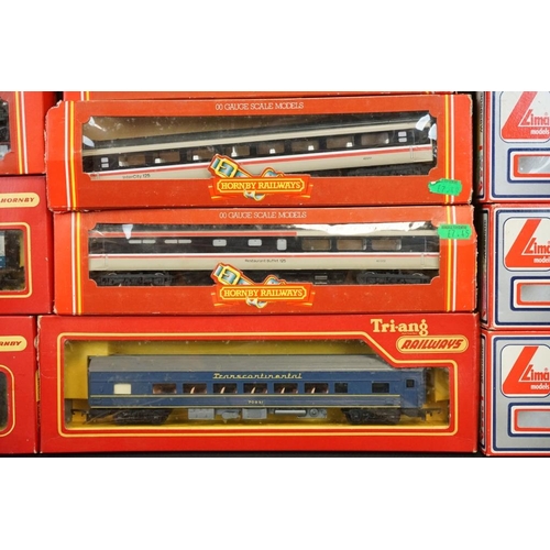 129 - 21 Boxed OO gauge items of rolling stock to include 17 x Hornby/Triang and 3 x Lima, mainly coaches,... 