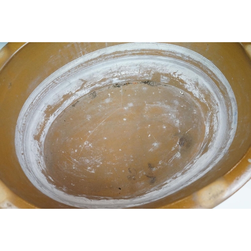 108 - Large 19th Century Victorian salt glazed Dairy Bowl of oval form with twin handles. Measures 23 x 54... 