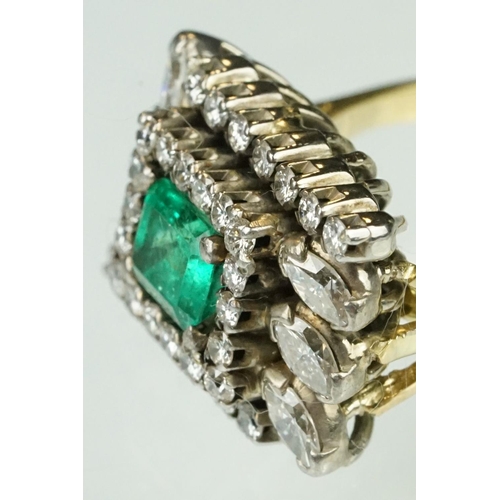 10 - Emerald and diamond 18ct yellow and white gold cluster ring, the central emerald cut emerald measuri... 