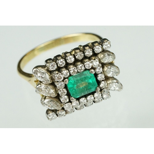 10 - Emerald and diamond 18ct yellow and white gold cluster ring, the central emerald cut emerald measuri... 