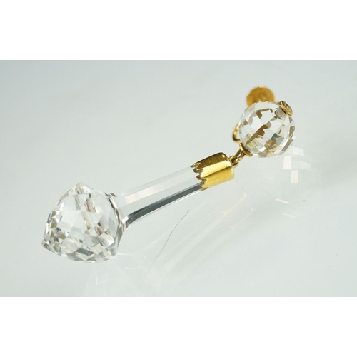 107 - Pair of crystal yellow metal drop earrings, the tapered briolette cut dropper suspended from the fou... 