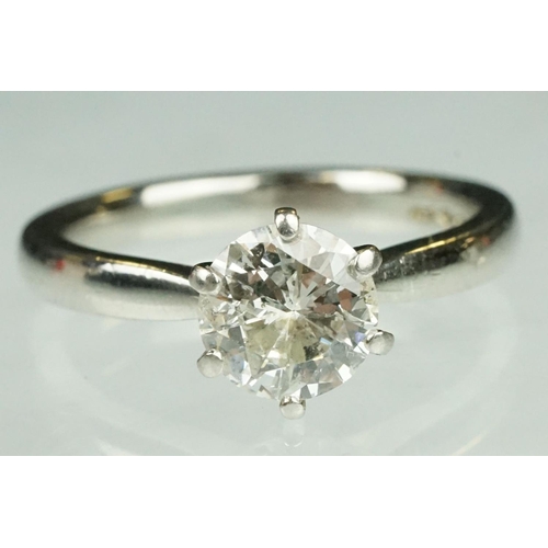 11 - Diamond solitaire platinum ring, the round brilliant cut diamond weighing approx 1.50 carat (depth c... 