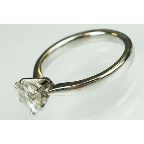 11 - Diamond solitaire platinum ring, the round brilliant cut diamond weighing approx 1.50 carat (depth c... 