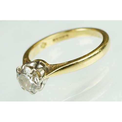 12 - Diamond solitaire 18ct yellow gold ring, the round brilliant cut diamond weighing approx 1.0 carat, ... 