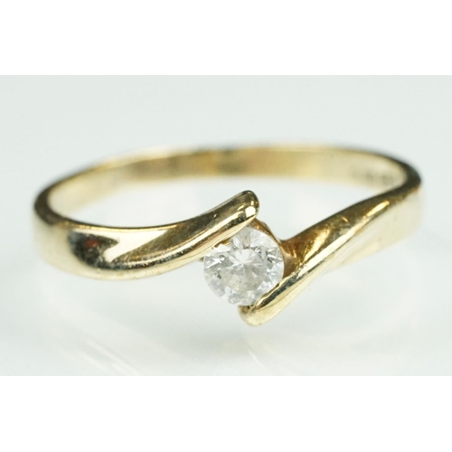 125 - Paste 9ct yellow gold seven stone dress ring, size O½; a paste 9ct yellow gold ring, crossover shoul... 