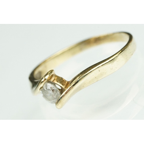 125 - Paste 9ct yellow gold seven stone dress ring, size O½; a paste 9ct yellow gold ring, crossover shoul... 