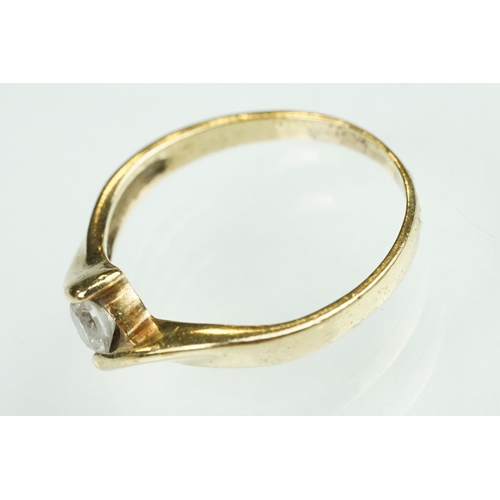 125 - Paste 9ct yellow gold seven stone dress ring, size O½; a paste 9ct yellow gold ring, crossover shoul... 