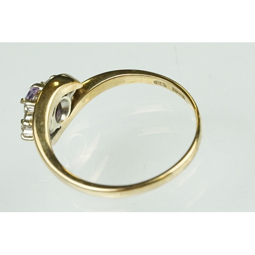 125 - Paste 9ct yellow gold seven stone dress ring, size O½; a paste 9ct yellow gold ring, crossover shoul... 