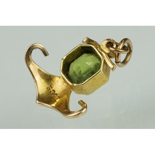 144 - Edwardian 15ct gold peridot and pearl pendant together with a yellow metal filigree bracelet with sp... 