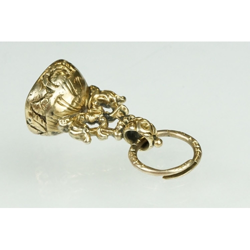 15 - 19th century citrine yellow metal fob seal, the intaglio citrine seal depicting a sunflower and the ... 