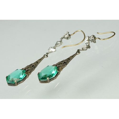 152 - Pair of 1920s Art Deco paste drop earrings having emerald coloured stones with marcasite set mounts ... 