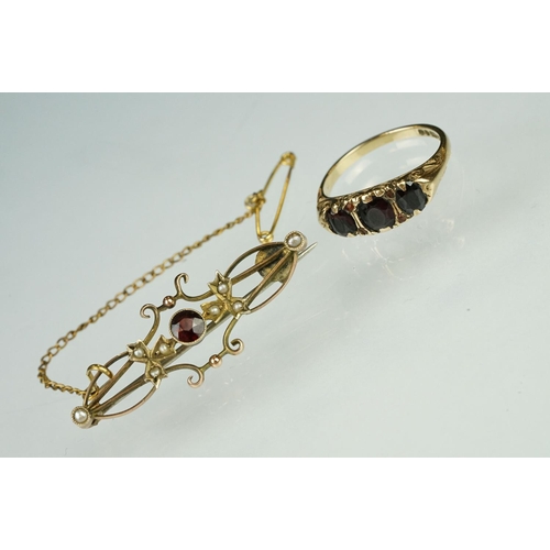 157 - Hallmarked 9ct gold and garnet three stone ring (hallmarked Birmingham 1976, N.5) together with an E... 