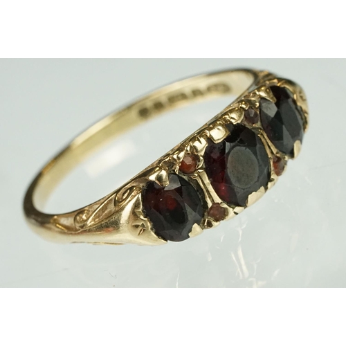 157 - Hallmarked 9ct gold and garnet three stone ring (hallmarked Birmingham 1976, N.5) together with an E... 